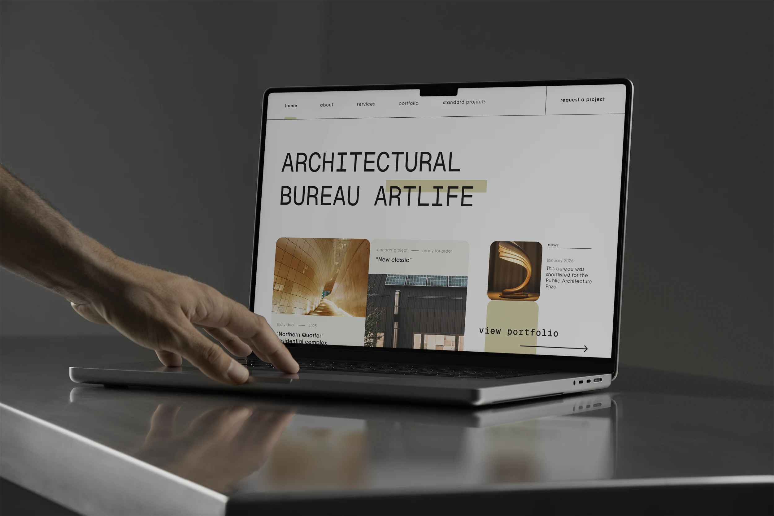 Artlife website displayed on a MacBook